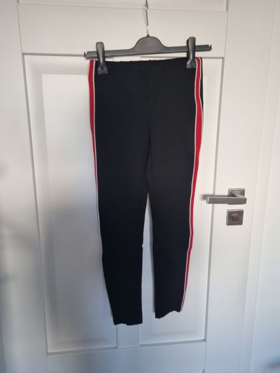 Black Pants With Red And White Side Stripes