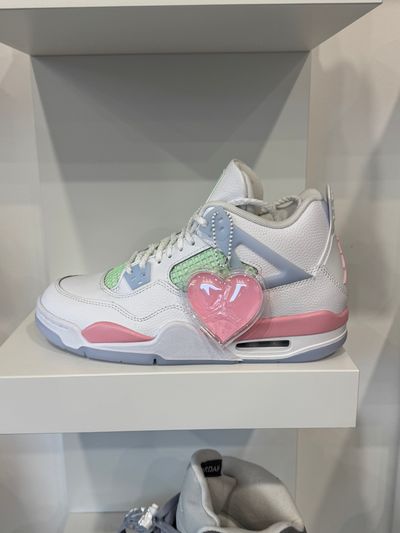 White Sneaker With Pink And Green Accents