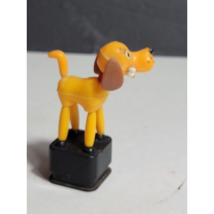 Yellow Dog Figurine On Black Base image 2