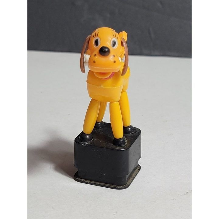 Yellow Dog Figurine On Black Base image 1