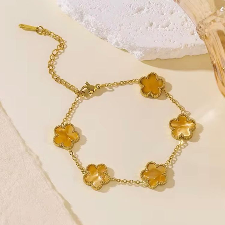 Gold-Tone Bracelet With Yellow Flower-Shaped Charms image 1
