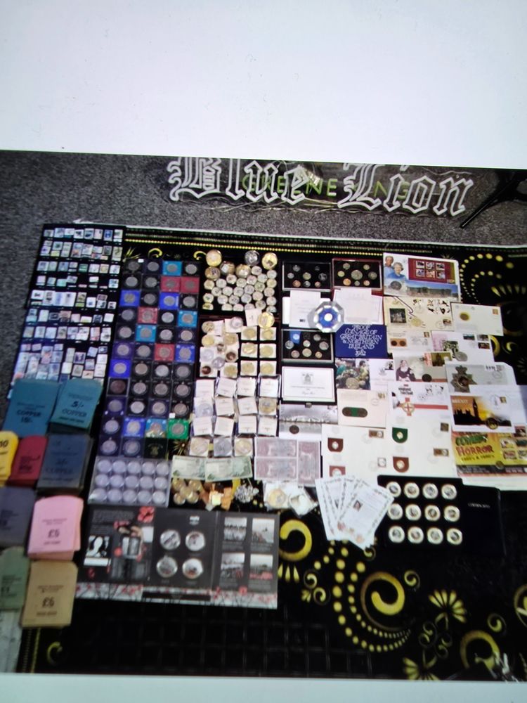Assorted Collectible Coins And Stamps image 1