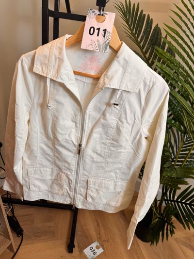 white zip-up jacket