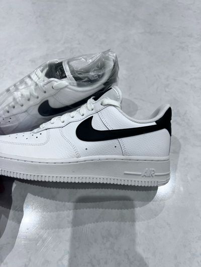 Nike AF1 white sneakers with black swoosh