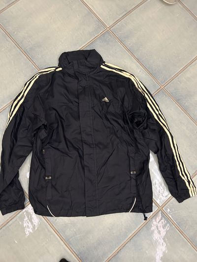 Adidas black jacket with white stripes