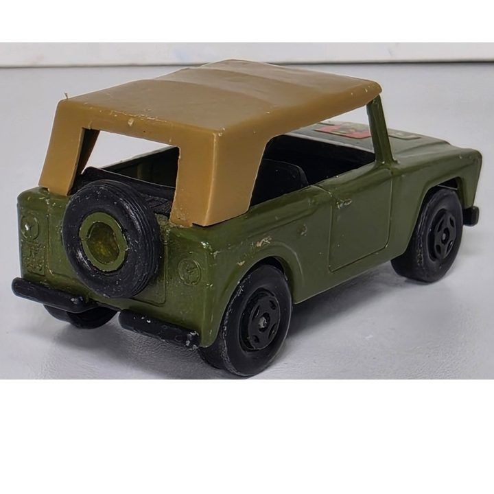 Green Toy Car With Tan Roof image 2