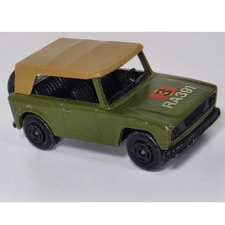 Green Toy Car With Tan Roof image 1