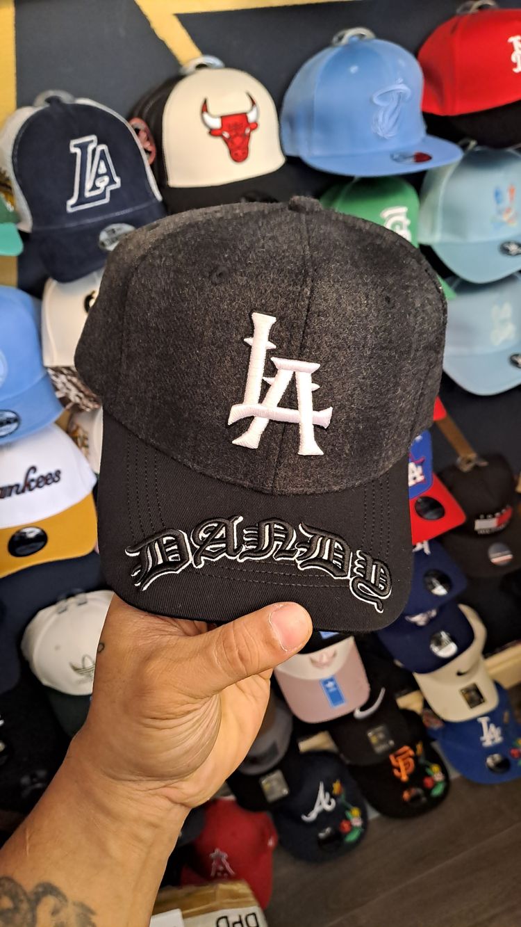 Black And Gray Cap With La Logo And Dazed Text