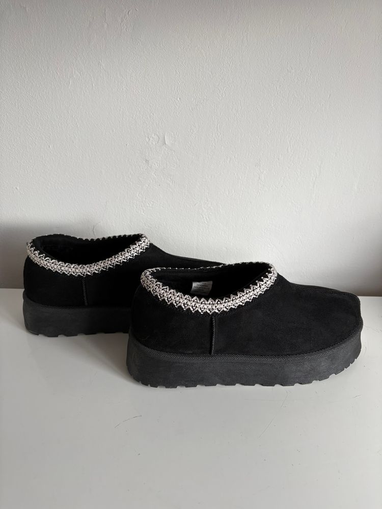 Black Slip-On Shoes With Decorative Trim image 1