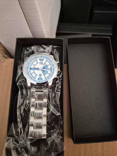 Silver Metal Wristwatch With Blue And White Dial