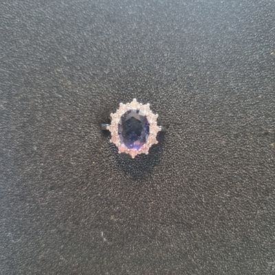 Silver Ring With Purple Gemstone And Clear Stones