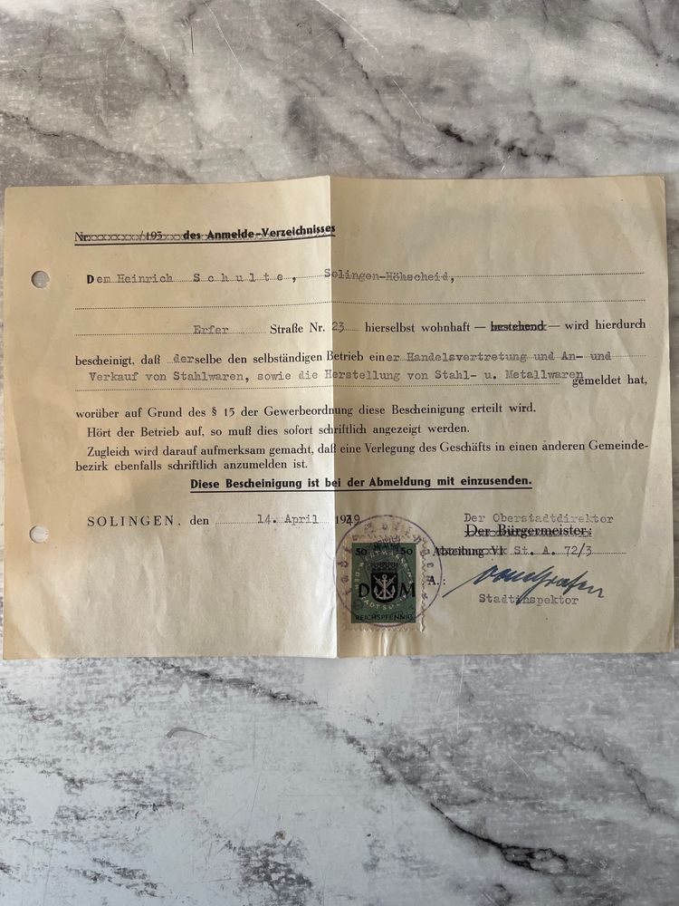 This document is a German business registration certificate (Gewerbeanmeldung-Bescheinigung) from 1939. With signature