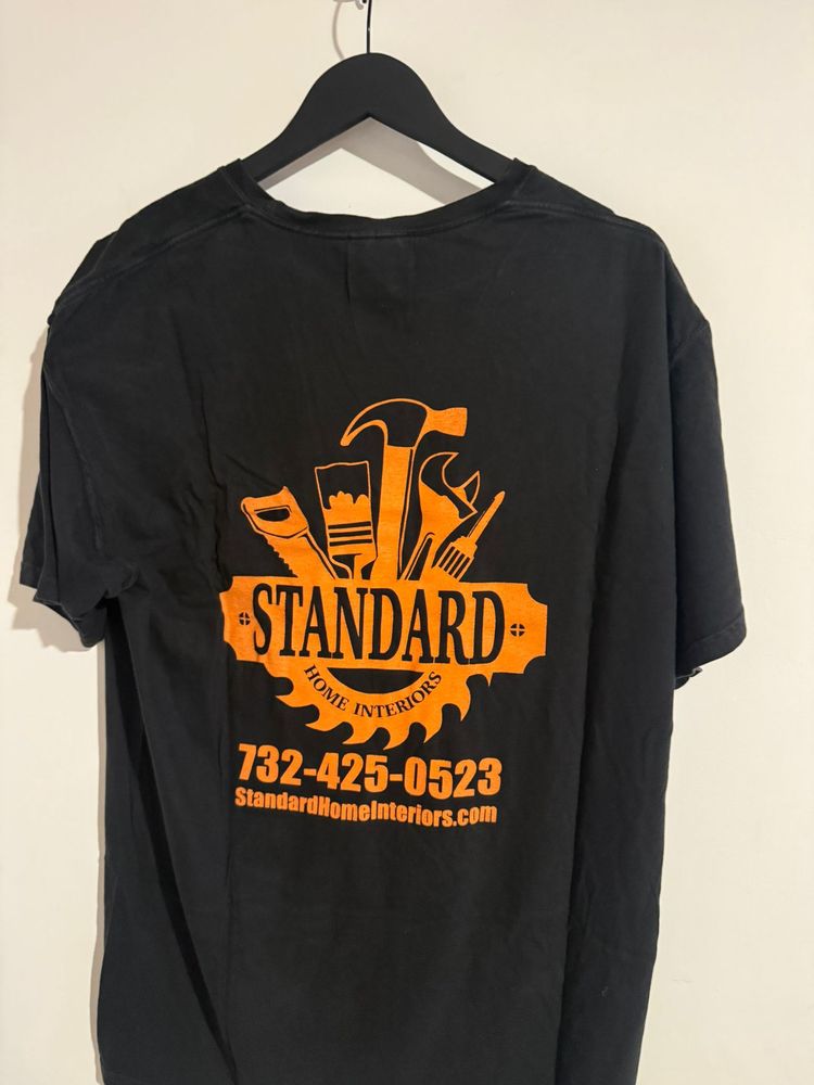 black T-shirt with orange print