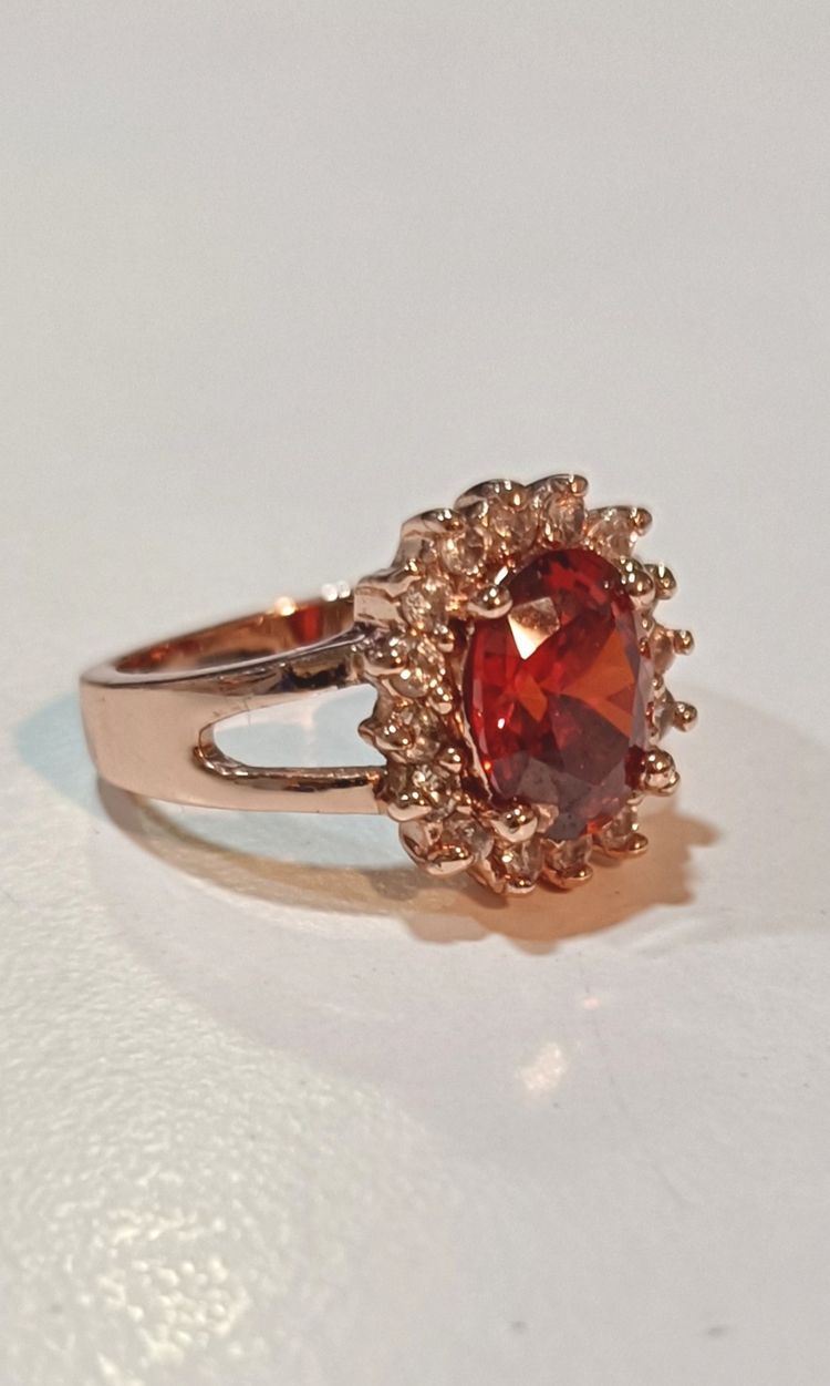 Bella Gone Gold Ring With Red Gemstone And Clear Stones product image