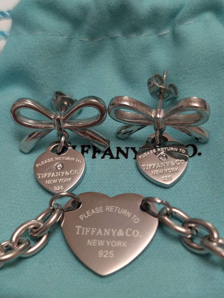 Silver Bow Earrings And Heart Tag Bracelet Set