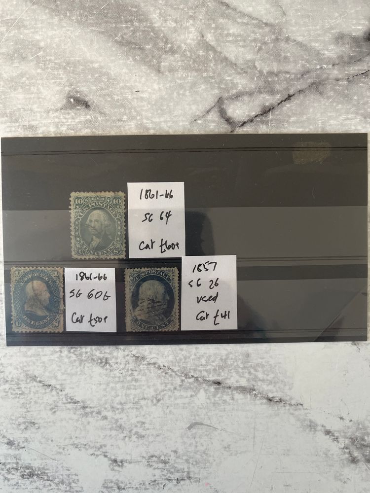 The presented set includes historical United States postage stamps from the 19th century.