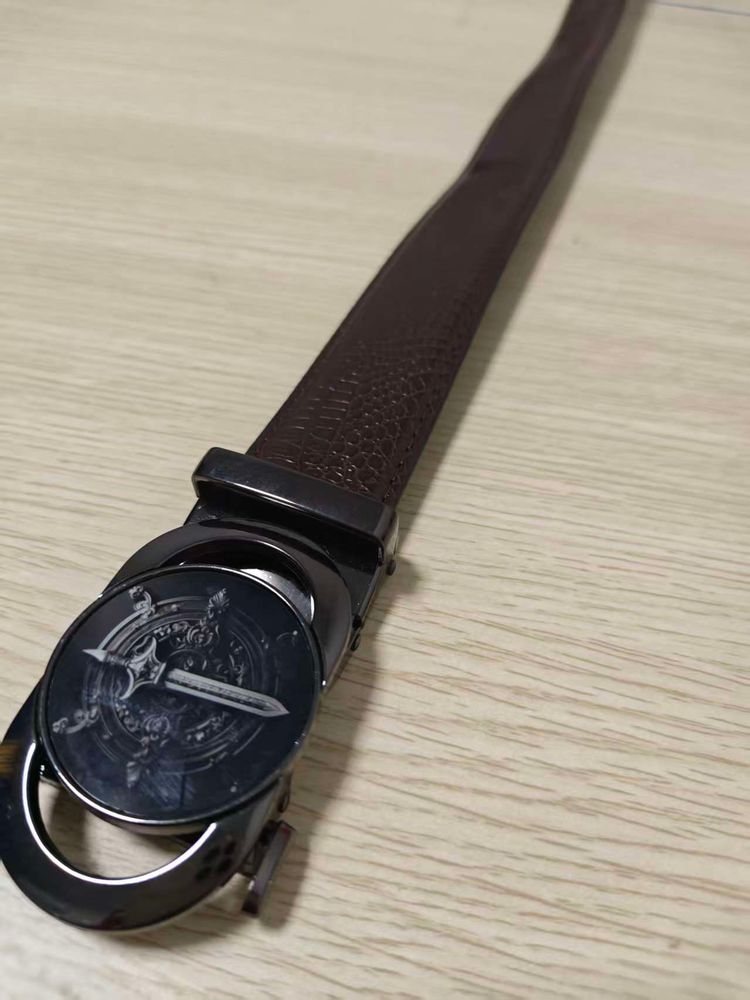 Brown Leather Belt With Decorative Buckle image 1