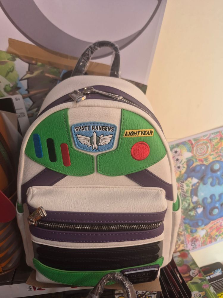 Live auction: LOUNGEFLY BAGS AND PINS by stealthman